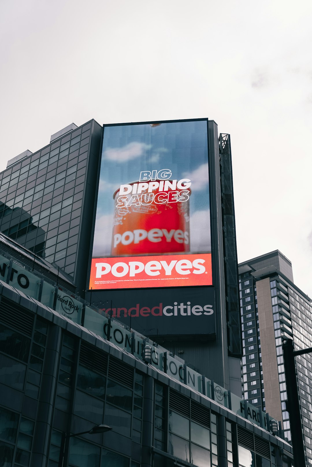 gallery-05 popeyes-billboard-advertises-big-dipping-sauces-std8ldclsx0